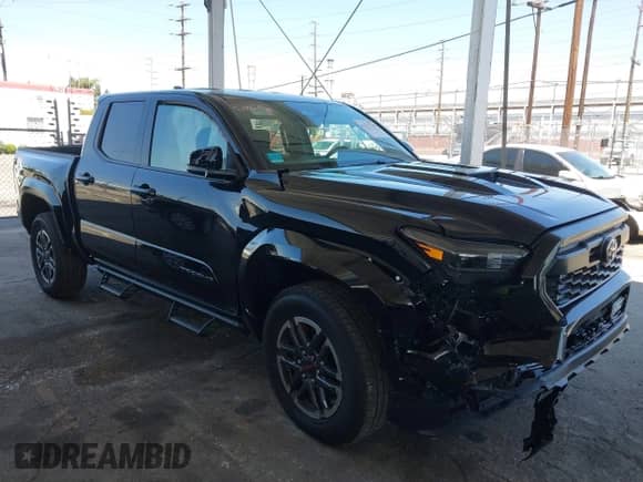 2025 Toyota Tacoma SR5 with VIN 3TMKB5FN5SM034762, listed as a IAAI auction lot 42217544 with 1,127 mi miles and . Bid and sale history available at DreamBid. Image 1.