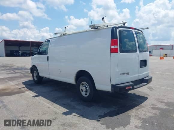 2012 Chevrolet Express Cargo with VIN 1GCWGFBA6C1146853, listed as a IAAI auction lot 42914621 with 151,392 mi miles and . Bid and sale history available at DreamBid. Image 3.