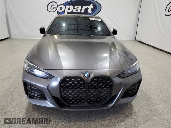 2021 BMW 4 Series 430i z VIN WBA53AP01MCG52316, wystawiony jako Copart lot #71084555 z przebiegiem 32 046 mil mil oraz Czysty tytuł • Clean title. Historia ofert i sprzedaży dostępna na DreamBid. Obrazek 5.