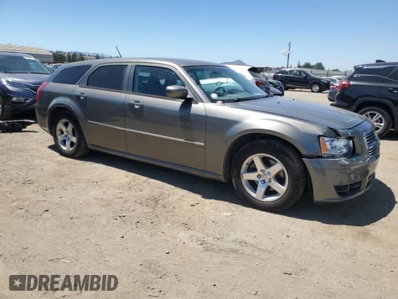 2008 Dodge Magnum SXT with VIN 2D4FV37V78H129071, listed as a Copart auction lot 64698115 with 127,442 mi miles and Salvage title. Bid and sale history available at DreamBid. Image 4.