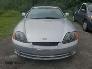 2003 Hyundai Tiburon GT с VIN KMHHN65F93U019840, выставлен на аукционе Copart как лот 74063394 с пробегом Не указан миль и На запчасти • Non repairable. История ставок и продаж доступна на DreamBid. Изображение 5.