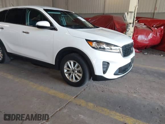 2019 Kia Sorento LX with VIN 5XYPG4A59KG561290, listed as a IAAI auction lot 42674023 with 78,091 mi miles and . Bid and sale history available at DreamBid. Image 17.