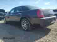 2005 Chrysler 300 C with VIN 2C3AA63H35H104303, listed as a Copart auction lot 82310295 with 128,937 mi miles and Salvage title. Bid and sale history available at DreamBid. Image 2.