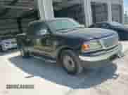 2002 Ford F-150 XLT с VIN 1FTRW07L22KB04146, выставлен на аукционе Copart как лот 69320515 с пробегом 189 839 миль миль и Списание • Salvage title. История ставок и продаж доступна на DreamBid. Изображение 13.