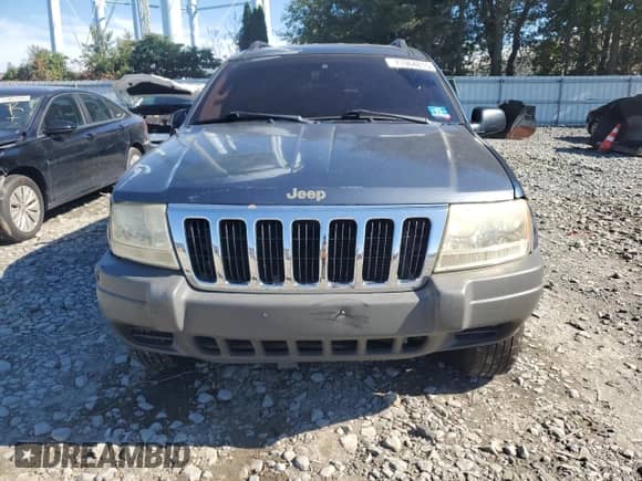 2002 Jeep Grand Cherokee Laredo with VIN 1J4GW48S42C251464, listed as a Copart auction lot 71964815 with 144,429 mi miles and Salvage title. Bid and sale history available at DreamBid. Image 5.