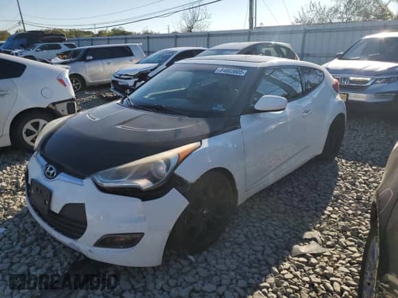 2012 Hyundai Veloster w/Gray Int z VIN KMHTC6AD3CU021197, wystawiony jako Copart lot #84803605 z przebiegiem 170 338 mil mil oraz Szkoda całkowita • Salvage title. Historia ofert i sprzedaży dostępna na DreamBid. Obrazek 1.