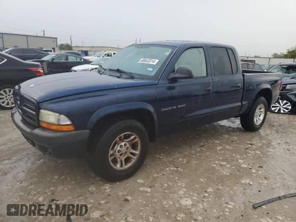 2002 Dodge Dakota Sport with VIN 1B7HL38N22S545507, listed as a Copart auction lot 80643314 with 181,125 mi miles and Salvage title. Bid and sale history available at DreamBid. Image 1.