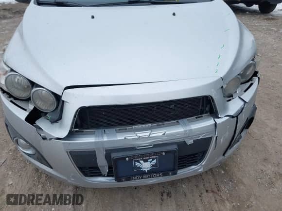 2014 Chevrolet Sonic LTZ z VIN 1G1JE5SB6E4218485, wystawiony jako IAAI lot #41407500 z przebiegiem 93 588 mil mil oraz . Historia ofert i sprzedaży dostępna na DreamBid. Obrazek 13.