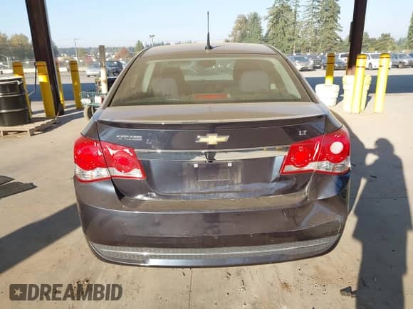 2014 Chevrolet Cruze 1LT z VIN 1G1PC5SB7E7473340, wystawiony jako IAAI lot #43386925 z przebiegiem 84 905 mil mil oraz . Historia ofert i sprzedaży dostępna na DreamBid. Obrazek 16.