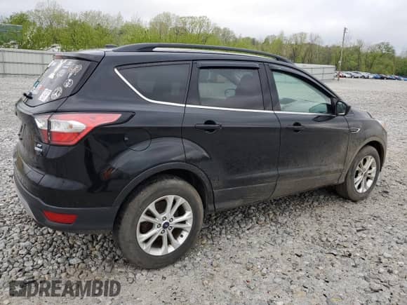 2018 Ford Escape SE z VIN 1FMCU9GD8JUA89756, wystawiony jako Copart lot #55978345 z przebiegiem 115 089 mil mil oraz Czysty tytuł • Clean title. Historia ofert i sprzedaży dostępna na DreamBid. Obrazek 3.
