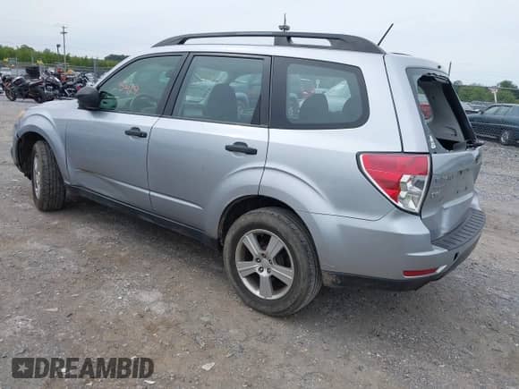 2012 Subaru Forester X with VIN JF2SHABC0CH420220, listed as a IAAI auction lot 43335419 with 127,338 mi miles and . Bid and sale history available at DreamBid. Image 3.