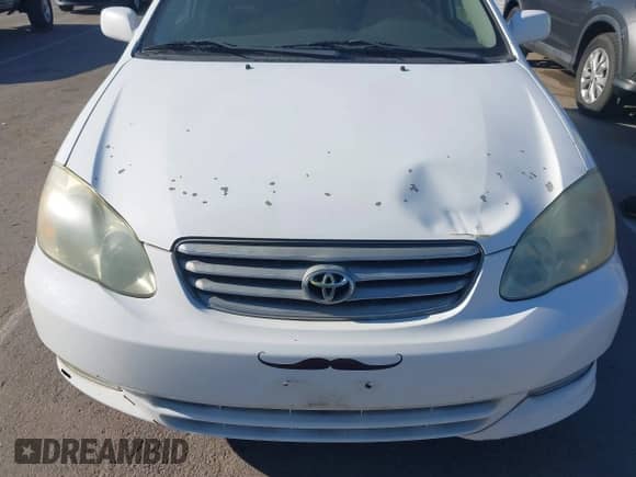 2004 Toyota Corolla CE z VIN 1NXBR32E14Z319846, wystawiony jako IAAI lot #43461526 z przebiegiem 183 920 mil mil oraz . Historia ofert i sprzedaży dostępna na DreamBid. Obrazek 12.