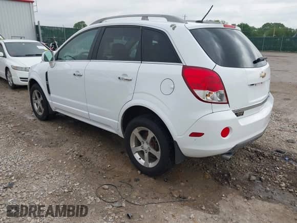 2012 Chevrolet Captiva Sport LTZ with VIN 3GNFL4E54CS654050, listed as a IAAI auction lot 42130624 with 99,792 mi miles and . Bid and sale history available at DreamBid. Image 3.