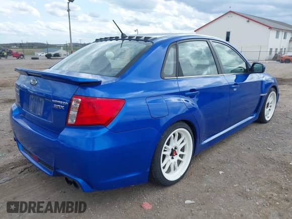 2012 Subaru WRX WRX with VIN JF1GV7E65CG017853, listed as a IAAI auction lot 41915526 with 93,268 mi miles and . Bid and sale history available at DreamBid. Image 4.