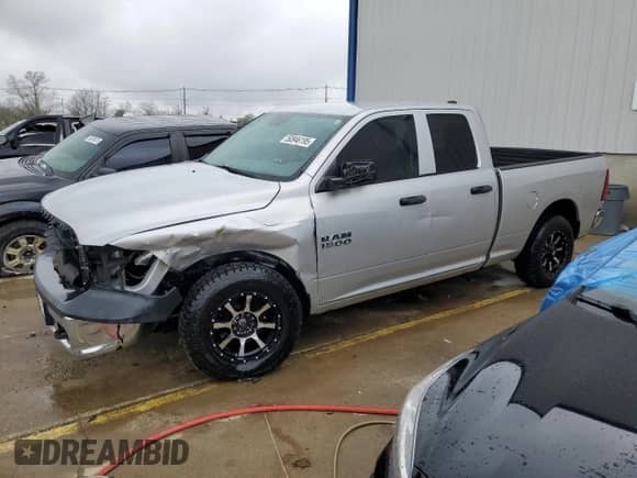 2014 Ram 1500 Tradesman with VIN 1C6RR7FG1ES204657, listed as a Copart auction lot 50946195 with 112,572 mi miles and Salvage title. Bid and sale history available at DreamBid. Image 1.