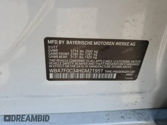 2017 BMW 7 Series 750i with VIN WBA7F0C34HGM21951, listed as a Copart auction lot 65593995 with 95,568 mi miles and Salvage title. Bid and sale history available at DreamBid. Image 12.