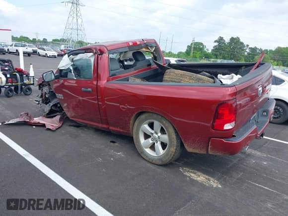 2014 Ram 1500 Express z VIN 3C6JR6ATXEG310186, wystawiony jako IAAI lot #42221601 z przebiegiem 56 684 mil mil oraz . Historia ofert i sprzedaży dostępna na DreamBid. Obrazek 3.