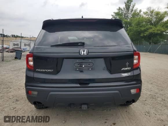 2019 Honda Passport EX-L with VIN 5FNYF8H50KB017384, listed as a Copart auction lot 67823615 with 34,154 mi miles and Salvage title. Bid and sale history available at DreamBid. Image 6.