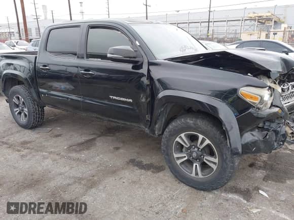 2017 Toyota Tacoma SR5 with VIN 3TMAZ5CN3HM026387, listed as a IAAI auction lot 42362780 with 216,739 mi miles and . Bid and sale history available at DreamBid. Image 1.