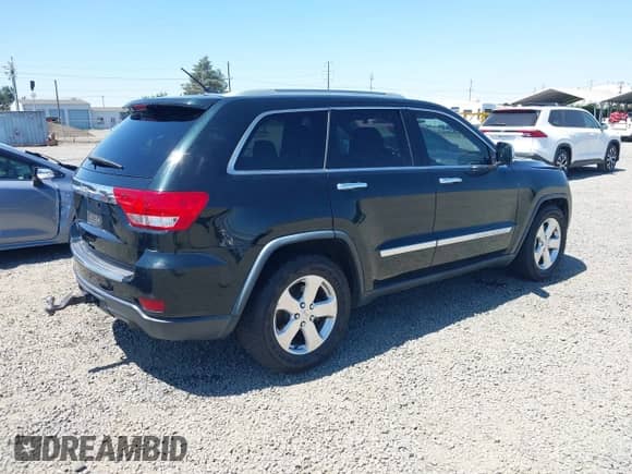 2012 Jeep Grand Cherokee Overland Summit z VIN 1C4RJFCT8CC274935, wystawiony jako IAAI lot #42711029 z przebiegiem 157 680 mil mil oraz . Historia ofert i sprzedaży dostępna na DreamBid. Obrazek 4.