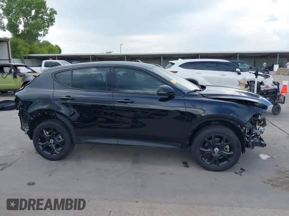 2024 Dodge Hornet GT with VIN ZACNDFANXR3A40043, listed as a IAAI auction lot 42575138 with 20,720 mi miles and . Bid and sale history available at DreamBid. Image 14.