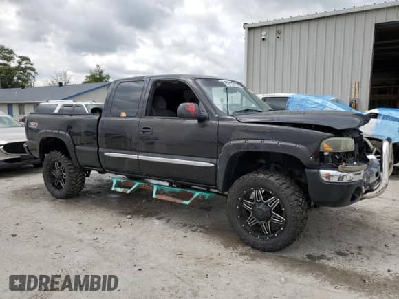 2003 GMC Sierra 1500 SLE with VIN 2GTEK19T431258372, listed as a Copart auction lot 58579865 with Not provided miles and Salvage title. Bid and sale history available at DreamBid. Image 4.