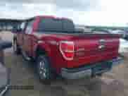 2013 Ford F-150 Lariat with VIN 1FTFW1ET0DKG07088, listed as a IAAI auction lot 42671190 with 202,968 mi miles and . Bid and sale history available at DreamBid. Image 14.