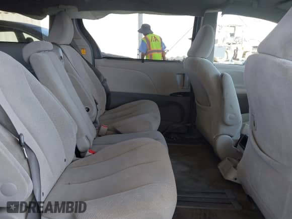 2013 Toyota Sienna LE AAS with VIN 5TDKK3DC2DS344974, listed as a IAAI auction lot 42560026 with 138,918 mi miles and . Bid and sale history available at DreamBid. Image 8.