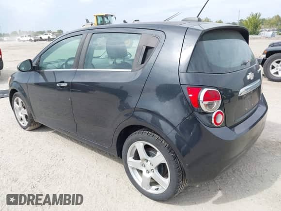 2015 Chevrolet Sonic LTZ with VIN 1G1JE6SB5F4187091, listed as a IAAI auction lot 43239971 with 123,749 mi miles and . Bid and sale history available at DreamBid. Image 3.