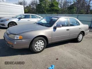 1995 Toyota Camry LE with VIN 4T1SK12E2SU488828, listed as a Copart auction lot 70946075 with 117,698 mi miles and Clean title. Bid and sale history available at DreamBid. Image 1.
