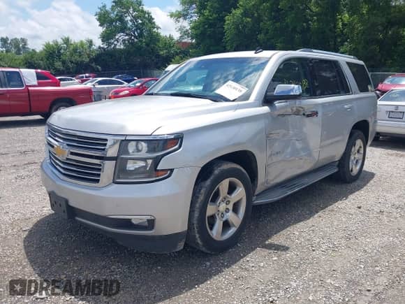 2015 Chevrolet Tahoe LTZ with VIN 1GNSCCKC9FR293871, listed as a IAAI auction lot 42630138 with 205,056 mi miles and . Bid and sale history available at DreamBid. Image 2.