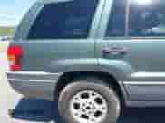 2002 Jeep Grand Cherokee с VIN 1J4GX38S12C244933, выставлен на аукционе IAAI как лот 42037931 с пробегом 171 201 миль миль и . История ставок и продаж доступна на DreamBid. Изображение 15.