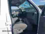 2013 Ford Econoline Cargo Commercial with VIN 1FTNE2EW7DDA67547, listed as a IAAI auction lot 43039595 with 156,606 mi miles and . Bid and sale history available at DreamBid. Image 5.