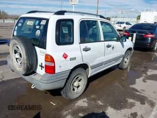 2003 Chevrolet Tracker z VIN 2CNBJ13C036950979, wystawiony jako IAAI lot #43494995 z przebiegiem 253 101 mil mil oraz . Historia ofert i sprzedaży dostępna na DreamBid. Obrazek 4.