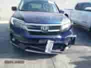 2022 Honda Pilot Touring 8-Passenger z VIN 5FNYF5H95NB017211, wystawiony jako IAAI lot #43010500 z przebiegiem 38 363 mil mil oraz . Historia ofert i sprzedaży dostępna na DreamBid. Obrazek 13.