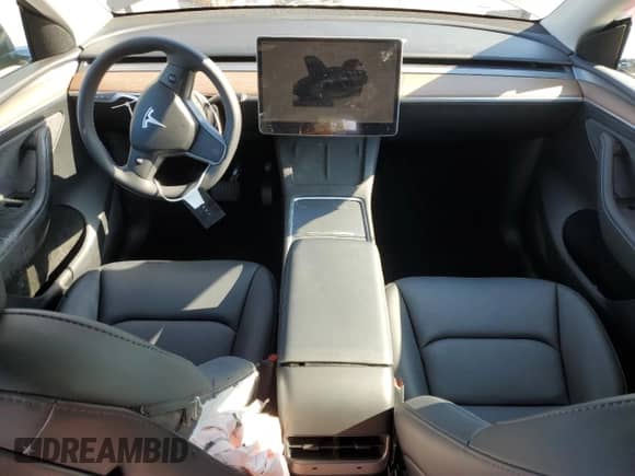 2024 Tesla Model Y Long Range with VIN 7SAYGDEE1RF073891, listed as a Copart auction lot 65612434 with 4,448 mi miles and Salvage title. Bid and sale history available at DreamBid. Image 8.