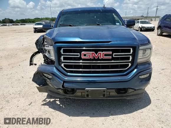 2018 GMC Sierra 1500 z VIN 1GTR1LEC8JZ169219, wystawiony jako Copart lot #63838975 z przebiegiem 91 685 mil mil oraz Szkoda całkowita • Salvage title. Historia ofert i sprzedaży dostępna na DreamBid. Obrazek 13.
