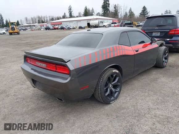 2014 Dodge Challenger R/T Plus with VIN 2C3CDYBT1EH177266, listed as a IAAI auction lot 41798977 with 109,489 mi miles and . Bid and sale history available at DreamBid. Image 4.