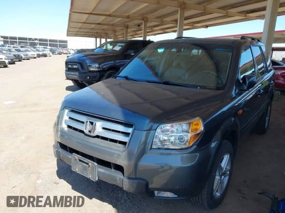 2006 Honda Pilot EX-L with VIN 5FNYF18746B013563, listed as a IAAI auction lot 42604056 with 250,068 mi miles and . Bid and sale history available at DreamBid. Image 6.