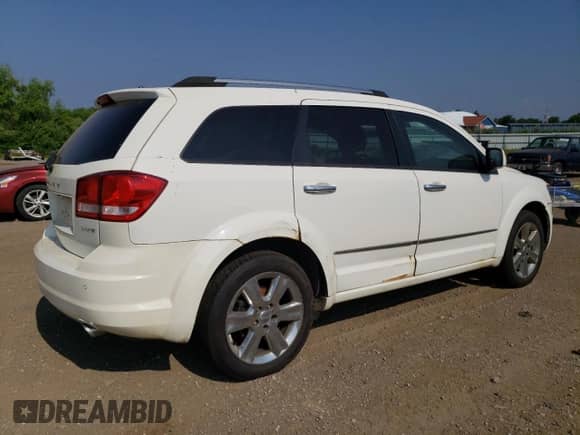 2011 Dodge Journey LUX с VIN 3D4PH9FG0BT512110, выставлен на аукционе Copart как лот 62699335 с пробегом 132 254 миль миль и Чистый • Clean title. История ставок и продаж доступна на DreamBid. Изображение 3.