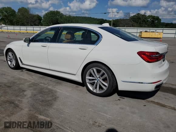 2016 BMW 7 Series 750i with VIN WBA7F0C57GGL99914, listed as a Copart auction lot 60837285 with 102,358 mi miles and Salvage title. Bid and sale history available at DreamBid. Image 2.