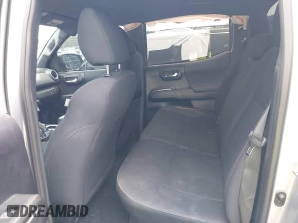 2019 Toyota Tacoma SR z VIN 3TMCZ5AN8KM287646, wystawiony jako IAAI lot #42969397 z przebiegiem 100 562 mil mil oraz . Historia ofert i sprzedaży dostępna na DreamBid. Obrazek 8.