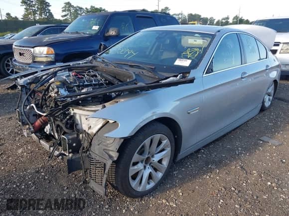 2014 BMW 5 Series 535i xDrive with VIN WBA5B3C57ED537633, listed as a IAAI auction lot 43073450 with Not provided miles and . Bid and sale history available at DreamBid. Image 2.