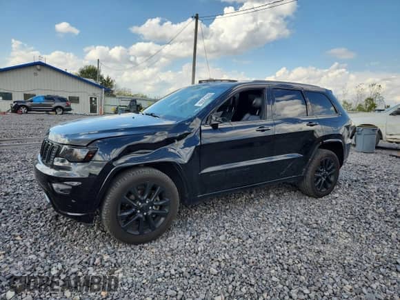 2018 Jeep Grand Cherokee Laredo with VIN 1C4RJFAG8JC244482, listed as a Copart auction lot 85572555 with 90,867 mi miles and Salvage title. Bid and sale history available at DreamBid. Image 1.