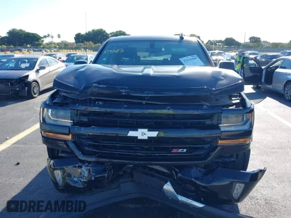 2017 Chevrolet Silverado 1500 LT with VIN 1GCUKREC3HF235469, listed as a IAAI auction lot 43219480 with 86,908 mi miles and . Bid and sale history available at DreamBid. Image 12.