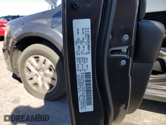 2014 Dodge Journey SE z VIN 3C4PDCAB4ET280147, wystawiony jako Copart lot #89488005 z przebiegiem 151 886 mil mil oraz Szkoda całkowita • Salvage title. Historia ofert i sprzedaży dostępna na DreamBid. Obrazek 13.