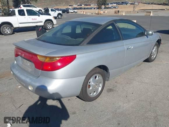 2002 Saturn SC with VIN 1G8ZY14732Z144888, listed as a IAAI auction lot 41617831 with 138,564 mi miles and . Bid and sale history available at DreamBid. Image 4.