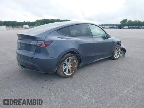 2023 Tesla Model Y Long Range with VIN 7SAYGDEE3PF804236, listed as a IAAI auction lot 42538213 with 78,944 mi miles and . Bid and sale history available at DreamBid. Image 4.
