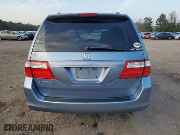 2007 Honda Odyssey EX-L z VIN 5FNRL38667B060322, wystawiony jako Copart lot #81350225 z przebiegiem 190 653 mil mil oraz Szkoda całkowita • Salvage title. Historia ofert i sprzedaży dostępna na DreamBid. Obrazek 6.
