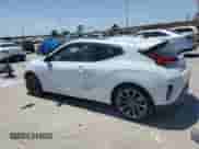 2019 Hyundai Veloster Premium с VIN KMHTG6AF9KU003467, выставлен на аукционе Copart как лот 57110235 с пробегом 94 581 миль миль и Списание • Salvage title. История ставок и продаж доступна на DreamBid. Изображение 2.